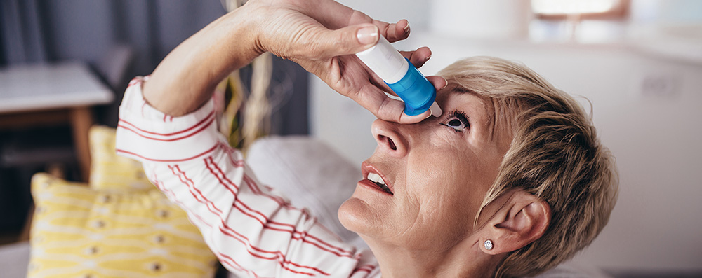 woman-using-eye-drops